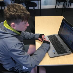 A boy using laptop